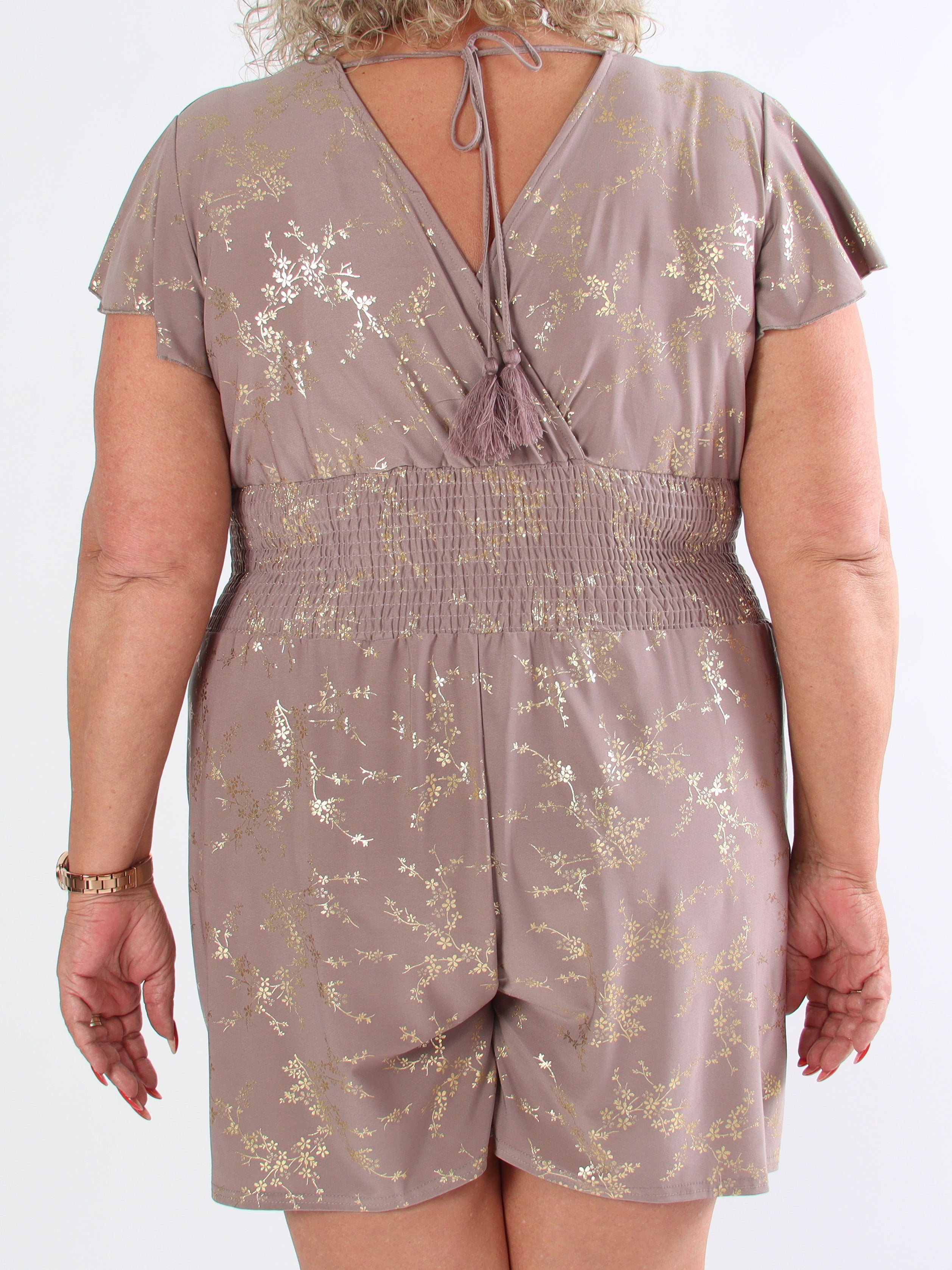 Pams Gold Playsuit - Elastisk jumpsuit i plusstorlek med guldtryck