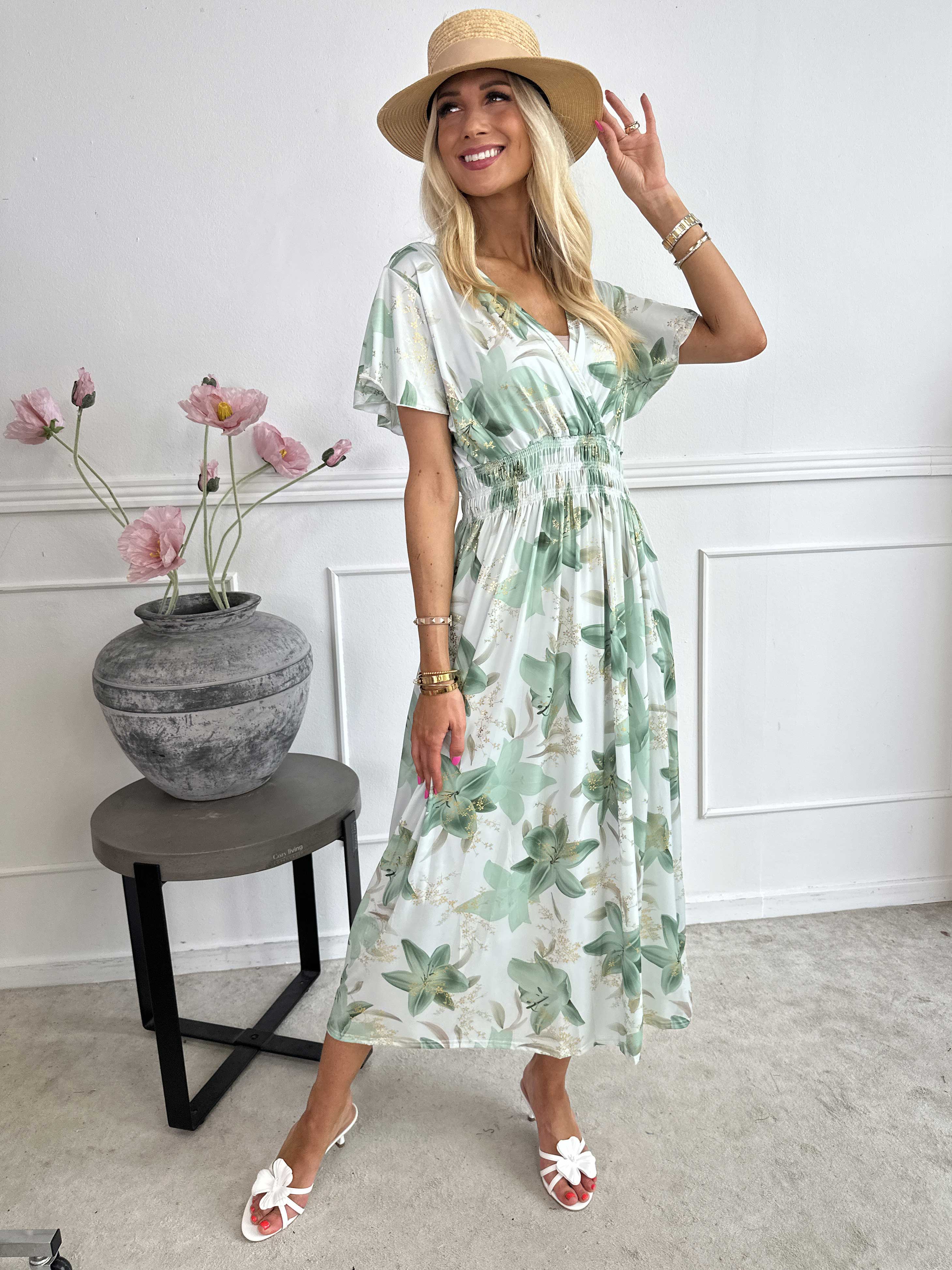 Pams Lilies - Elastisk klänning med liljemönster och gulddetaljer