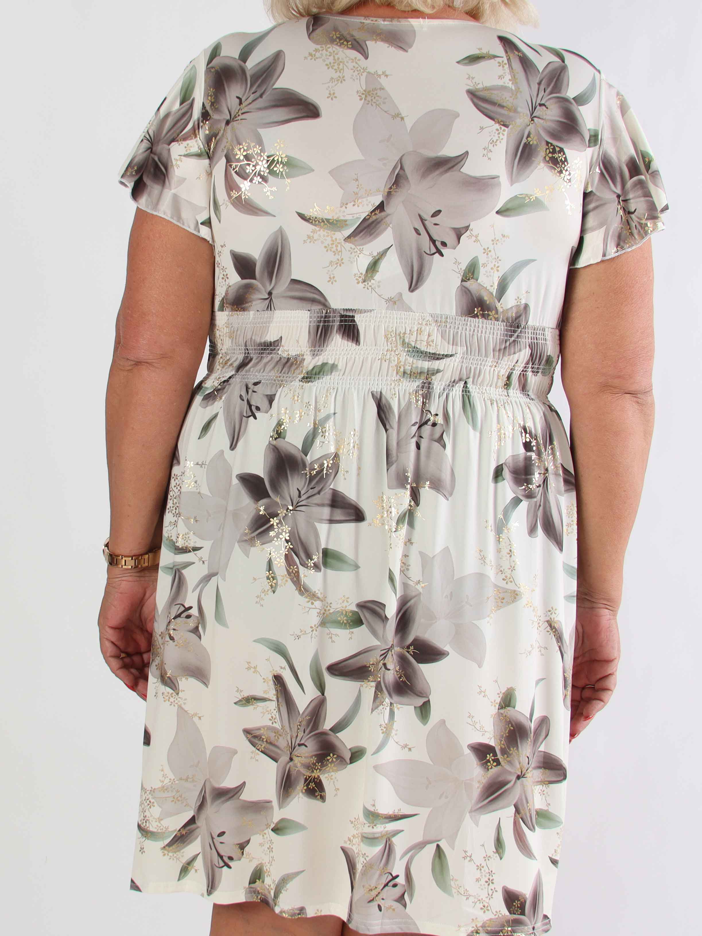 Pams Lilies Short - Kort elastisk plus size klänning med liljemönster och gulddetaljer