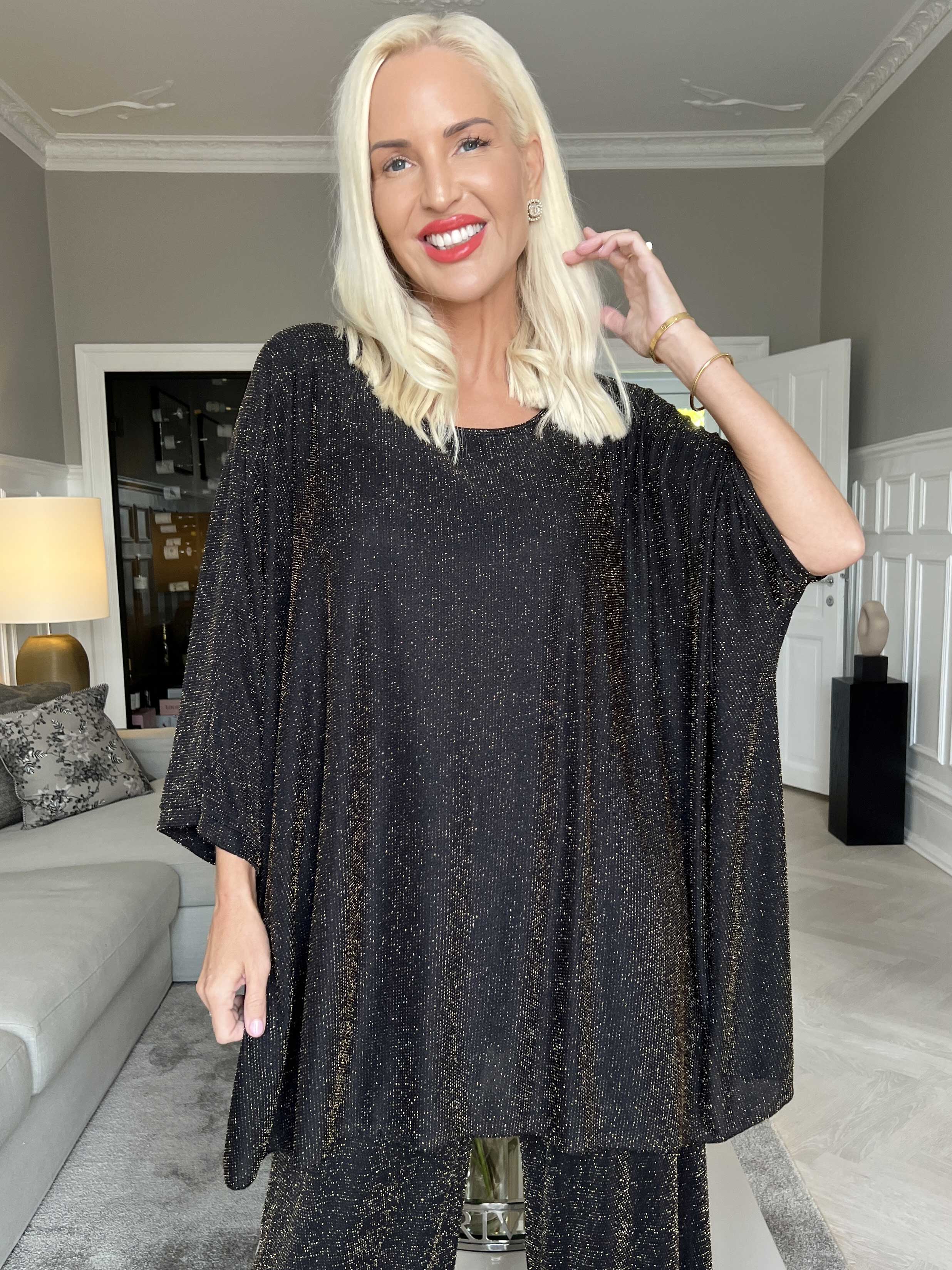Estella Glitter - Oversized tunika med fladdermusärmar