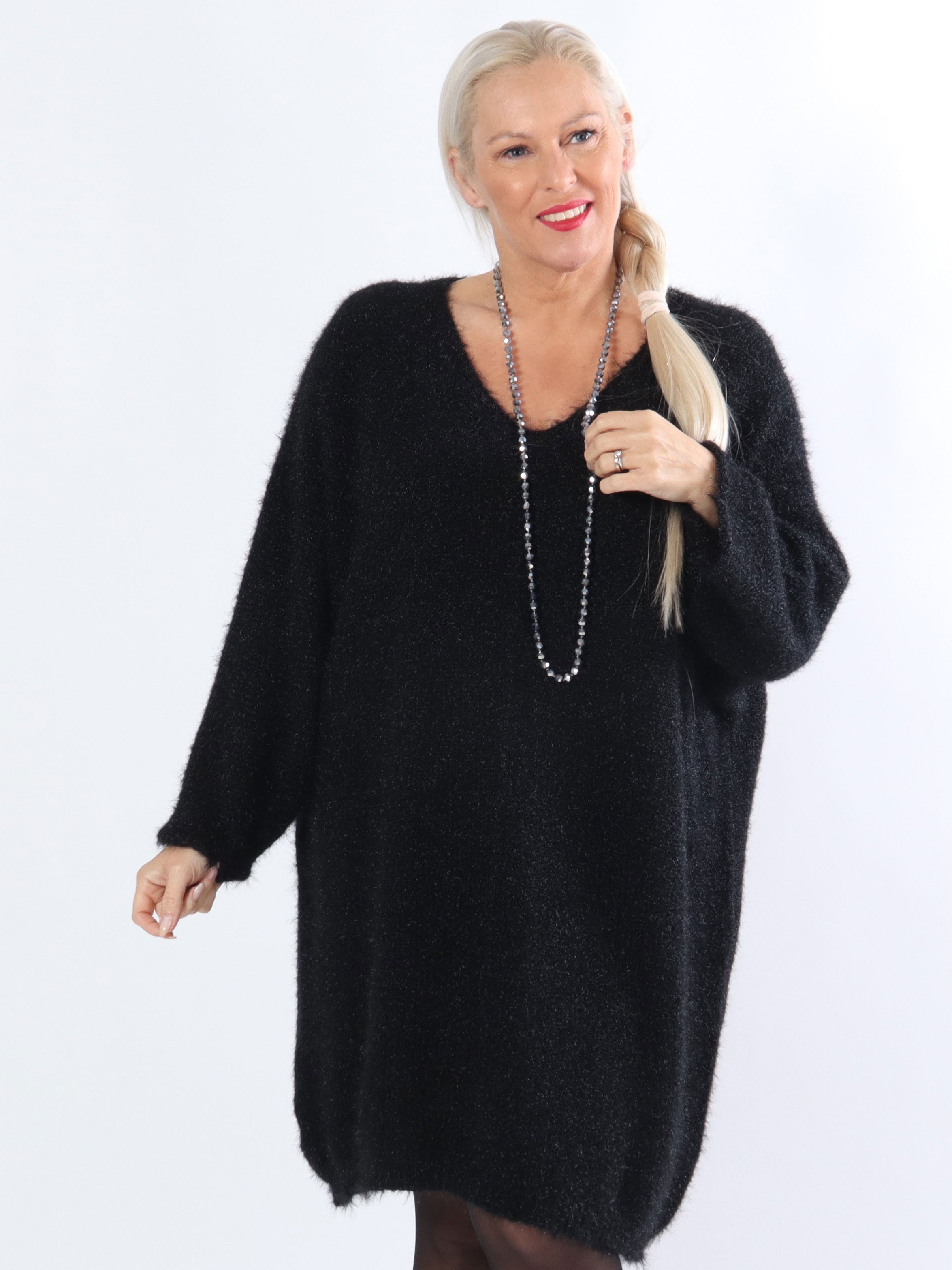 Andria - Mjuk plussize stickad klänning