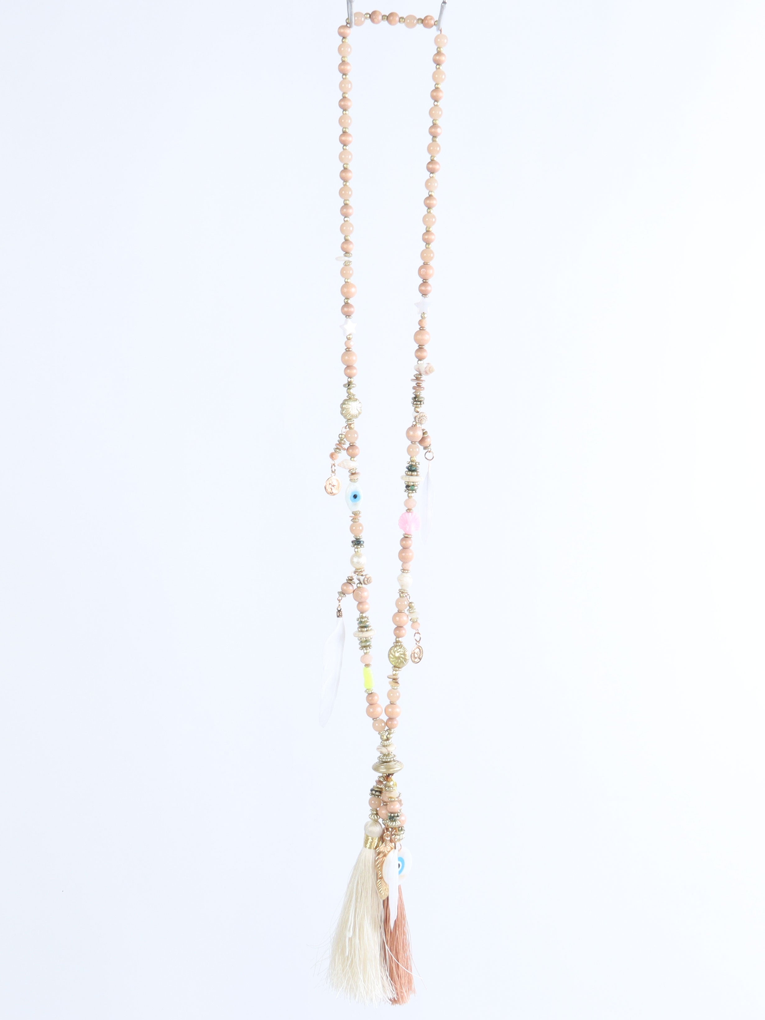 Melda - Beige halsband med fina pärlor och två tofsar