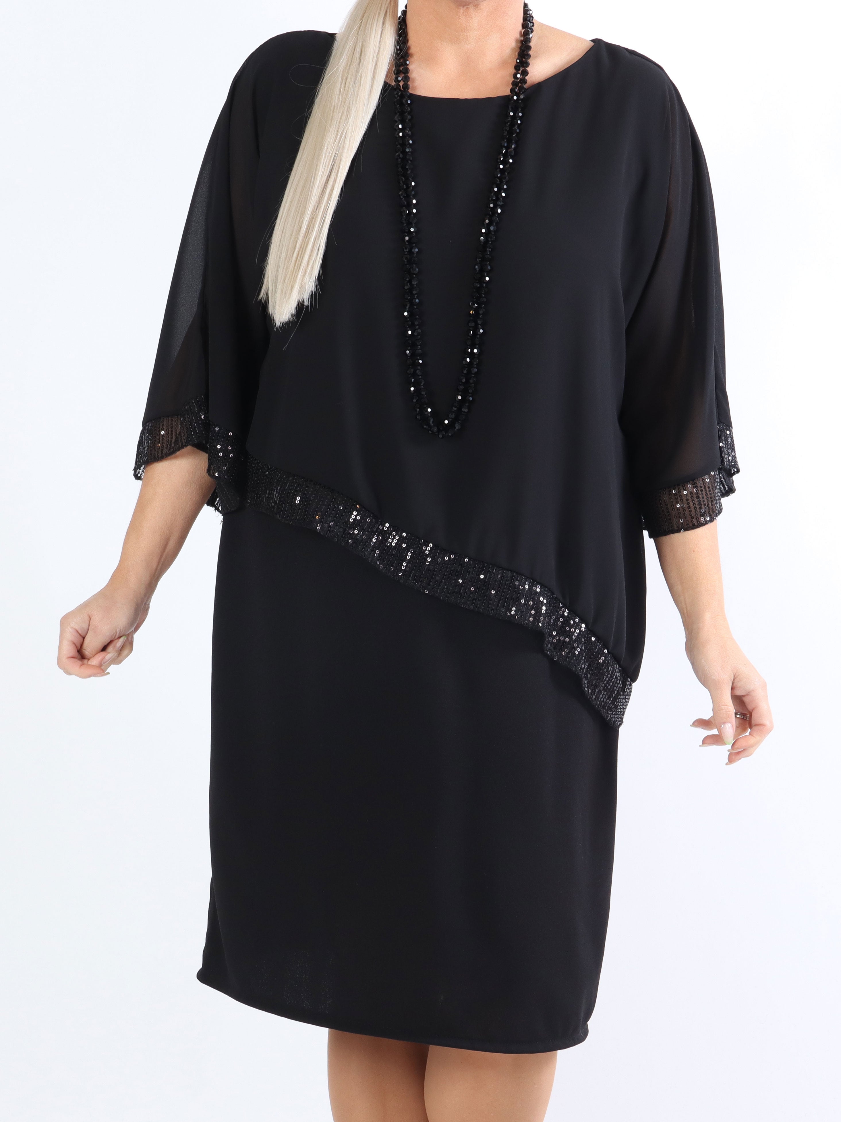 Amna - Plus size klänning i elegant look med paljettkant